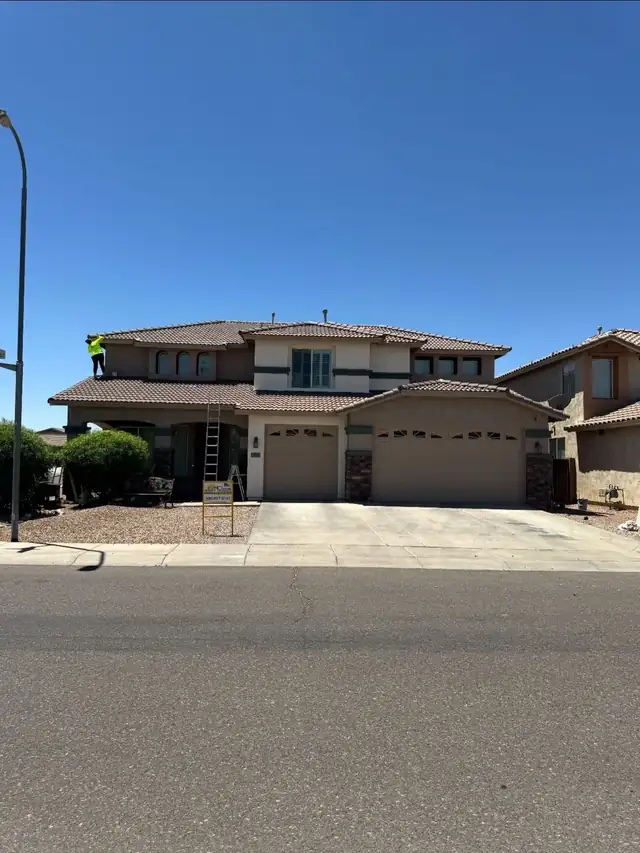 Two-story stucco home, finished exterior